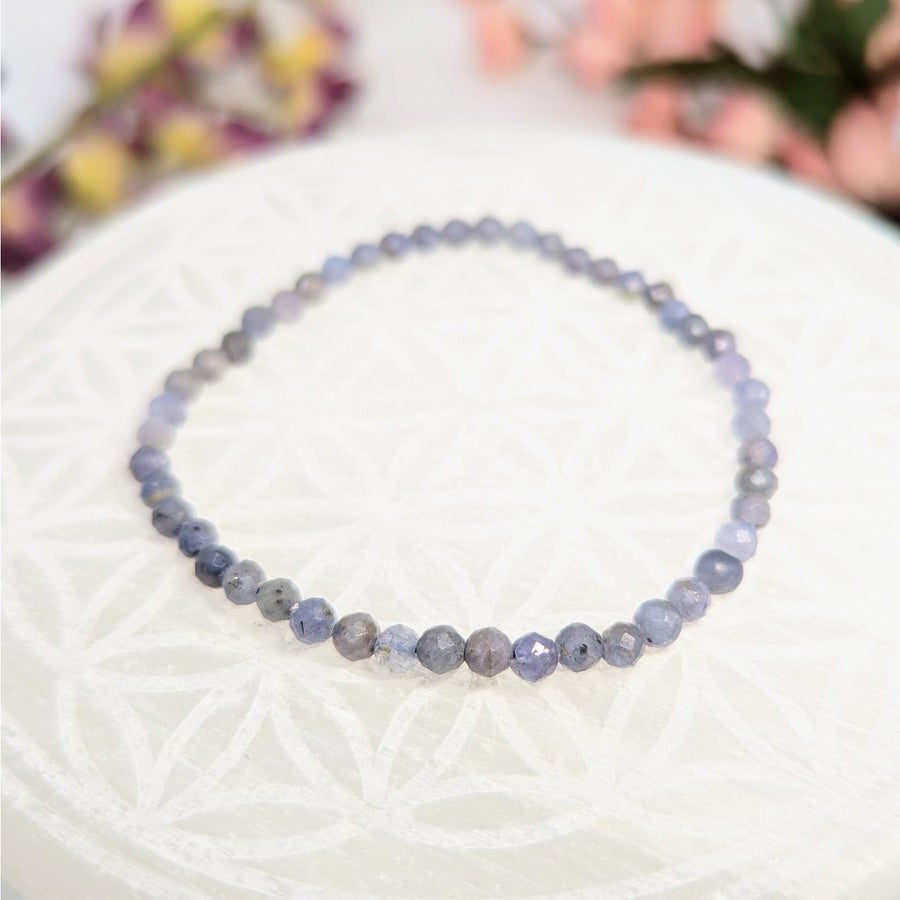 Beaded blue-gray Tanzanite bracelet with faceted 4mm crystals on a 7.5-inch strand
