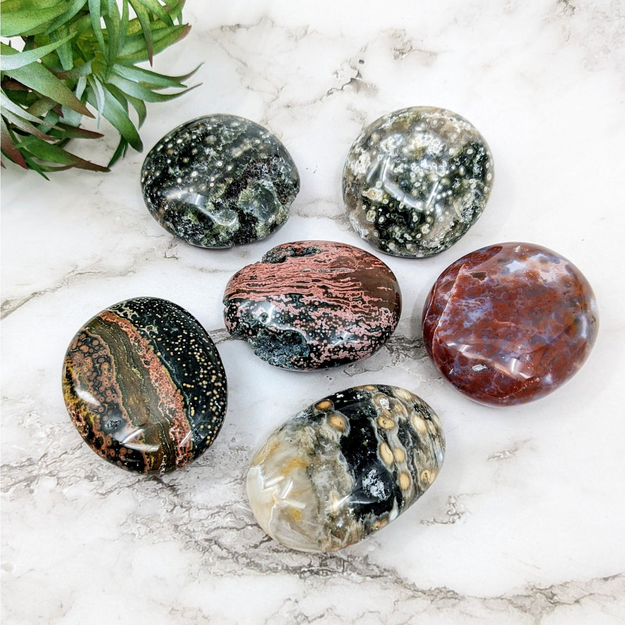 Selection of marbles in Ocean Jasper Pebble #LV4559 ranging from 2.1-2.3 inches