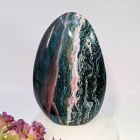Polished 6’’ Ocean Jasper freeform egg specimen with green, black, pink bands