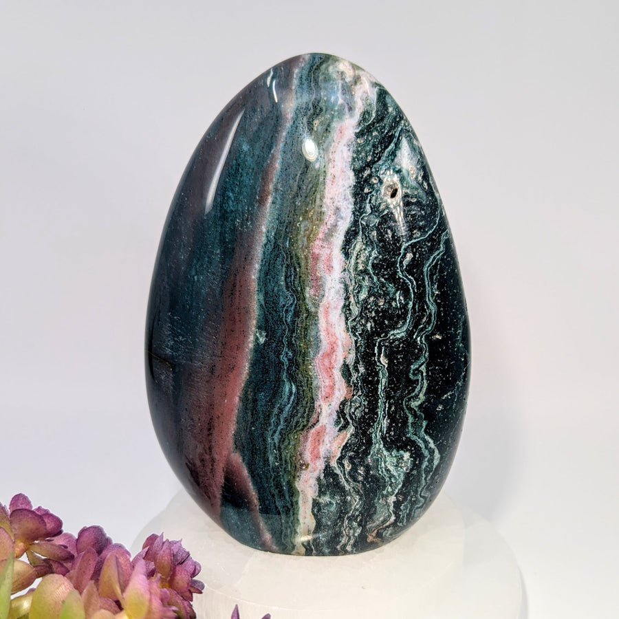 Polished 6’’ Ocean Jasper freeform egg specimen with green, black, pink bands