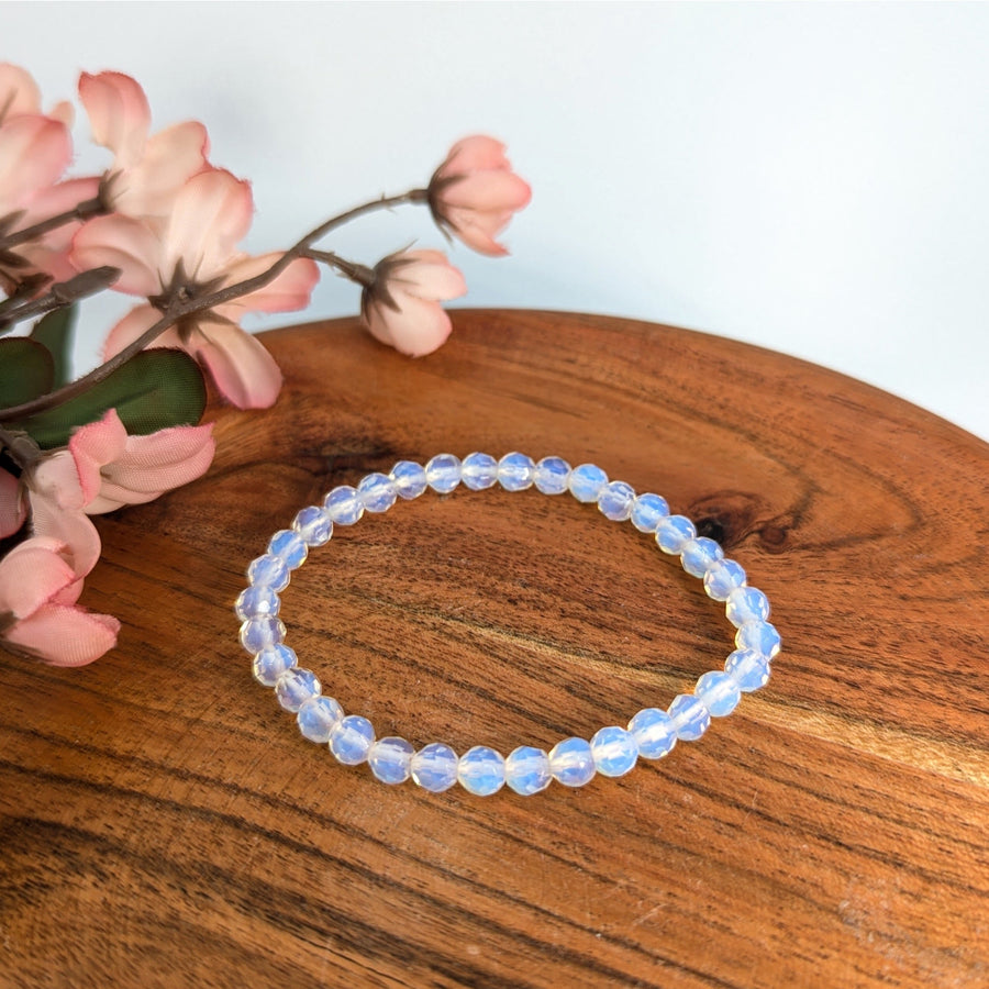 Opalite beaded bracelet with faceted 6mm beads showcasing a 3.5-inch length