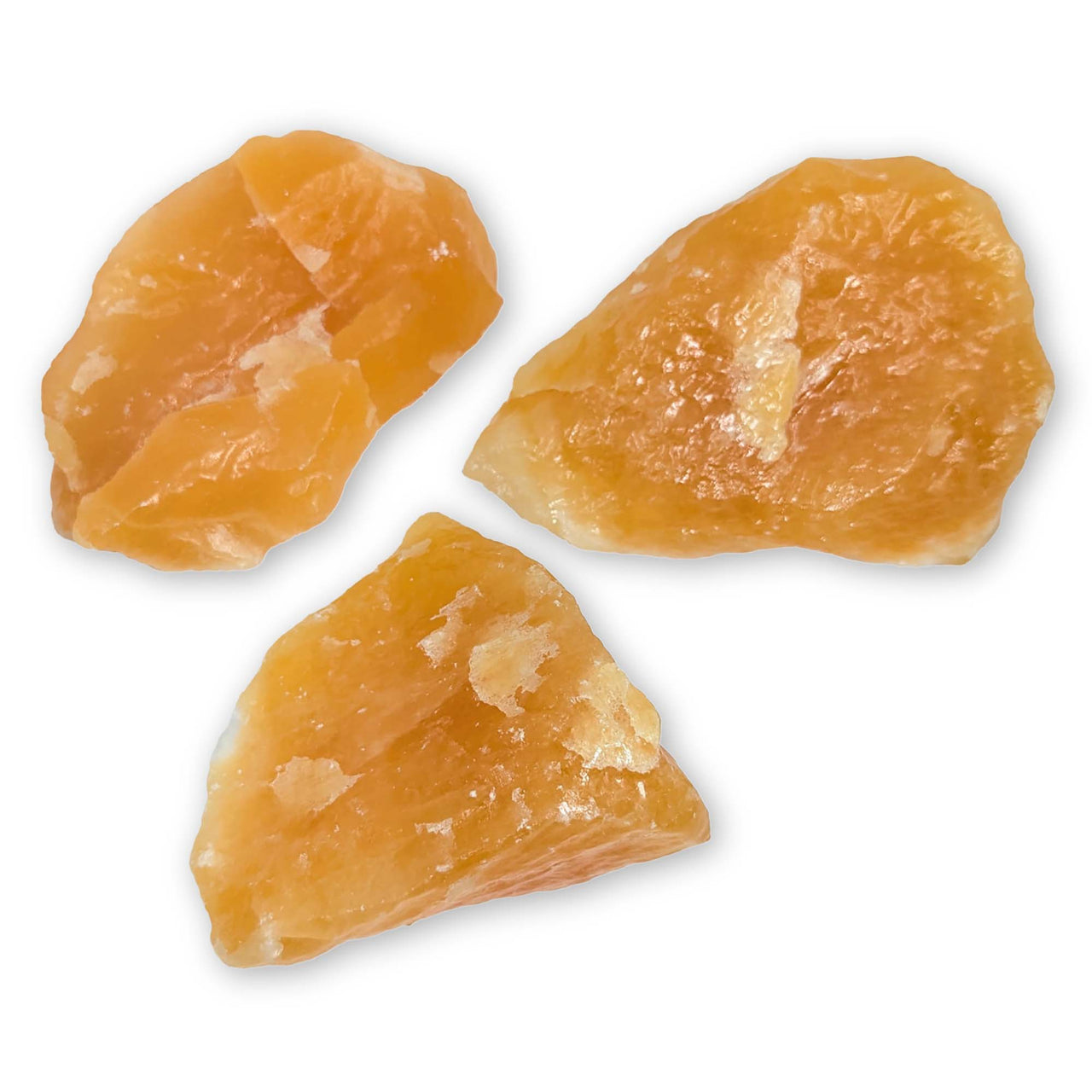 Three pieces of Orange Calcite Rough showcasing vibrant hues for crystal enthusiasts