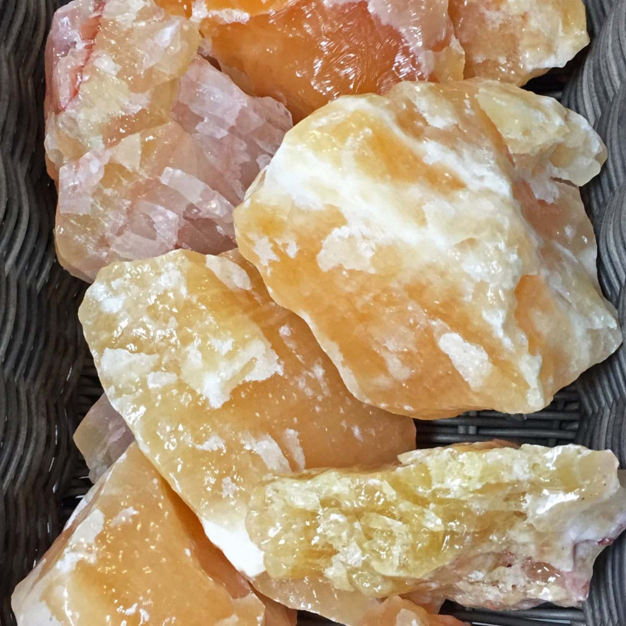 Raw chunks of pink Himalayan salt crystals for Orange Calcite Rough Chunks #R177