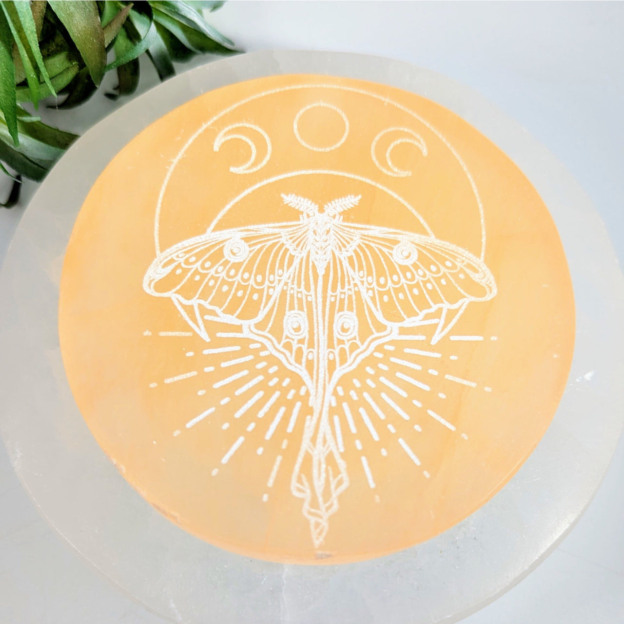 Orange Selenite Plate with White Moth and Moon Phases Design 4 inches