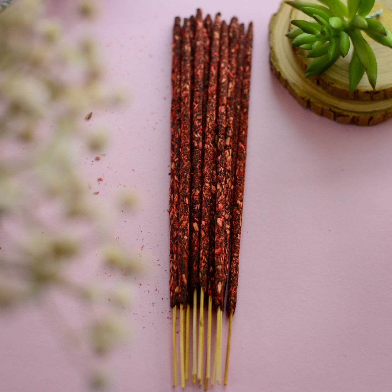 Bundle of reddish-brown Palo Santo smudge incense sticks with wooden bases, 10-pack pouch LV7369