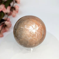 Thumbnail for Shimmering golden sphere from Peach Moonstone 2.3 Inch Sphere LV8032 product