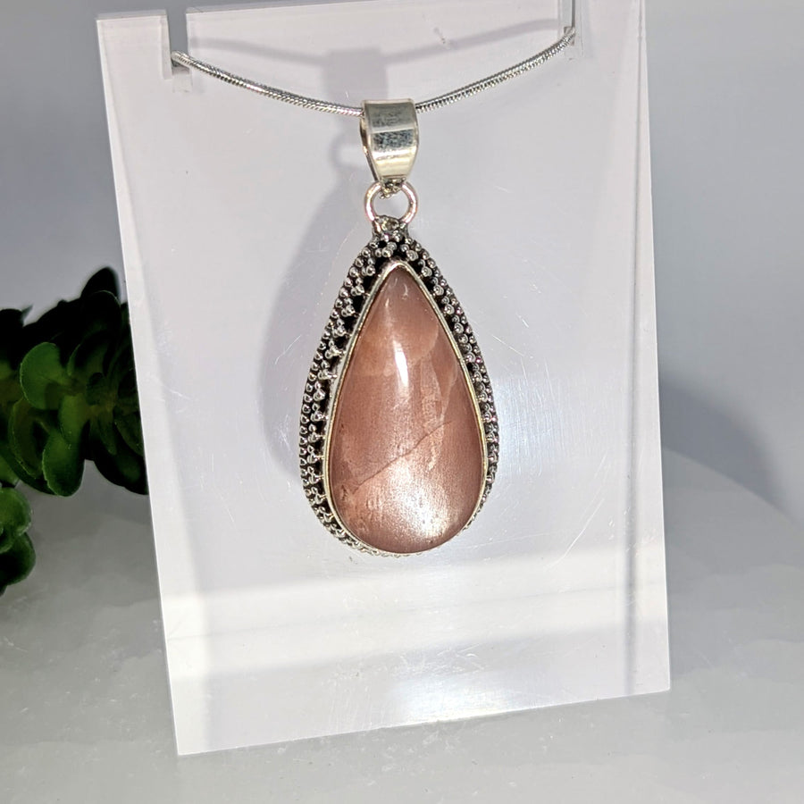 Peach moonstone 2-inch teardrop pendant #BC0674 with silver frame