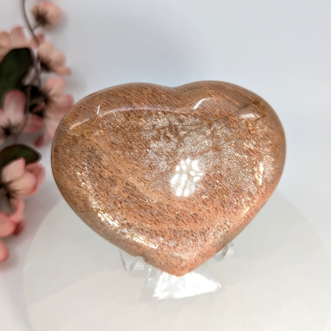 Polished brown heart-shaped gemstone with stand in Peach Moonstone 3.5 inch Heart product