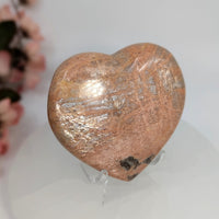 Thumbnail for Polished Sunstone Heart displayed with stand in the Peach Moonstone 3-inch Heart product