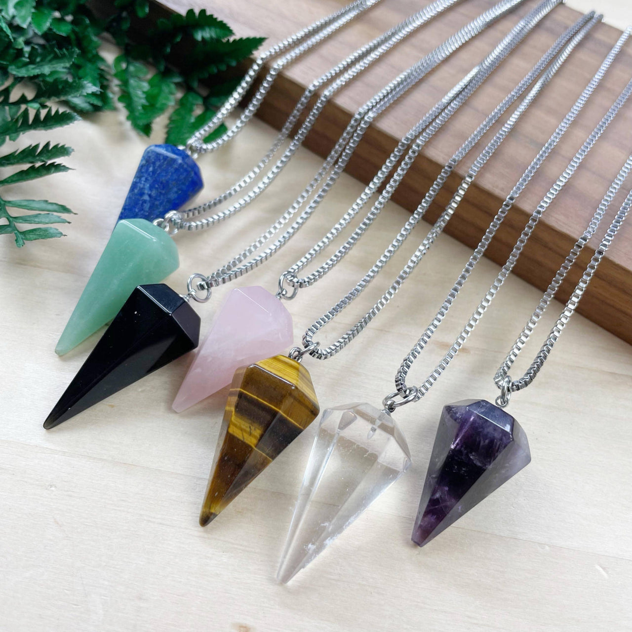 Six faceted gemstone crystal pendulums with silver 18’’ chains, LV9391