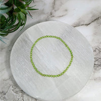 Thumbnail for White marble tray with a Peridot 7’ green beaded bracelet, 3mm #LV4042