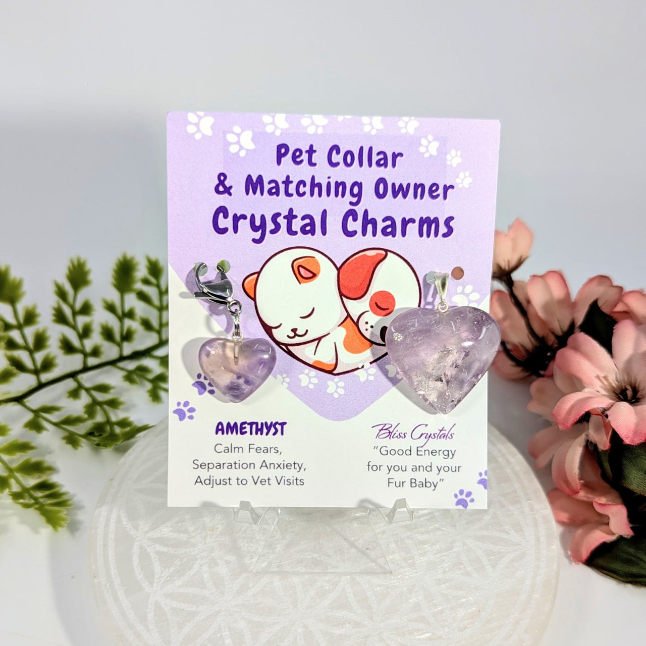 Amethyst heart crystal charms with silver clasps on branded card BC0184