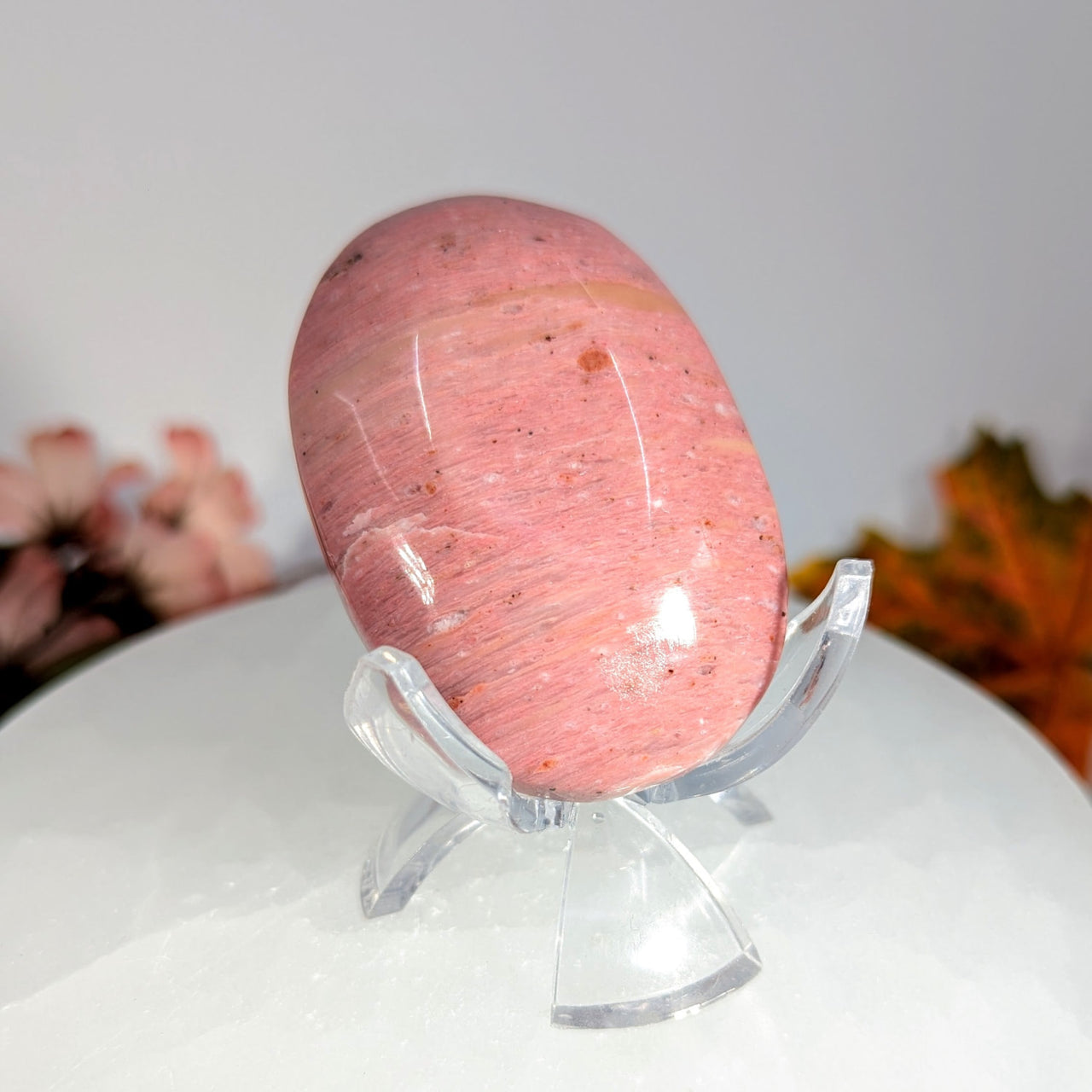Pink Rhodochrosite Egg on Clear Acrylic Stand