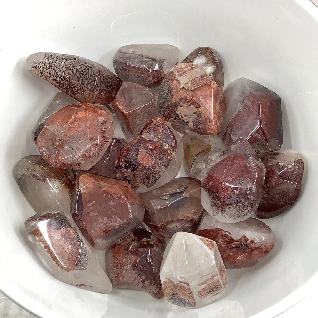 Phantom Hematoid Qtz Polished Point #TS033: A bowl of pink and white crystals