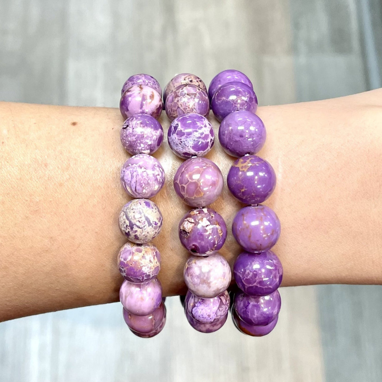 Three purple jasper stone bead bracelets showcasing the Phosphosiderite Bracelet J569