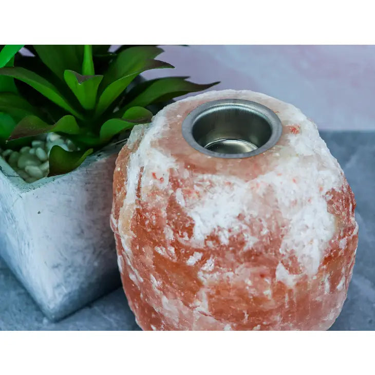 Small plant in a pot next to Pink Aromatherapy Himalayan Salt Lamp #LV3579