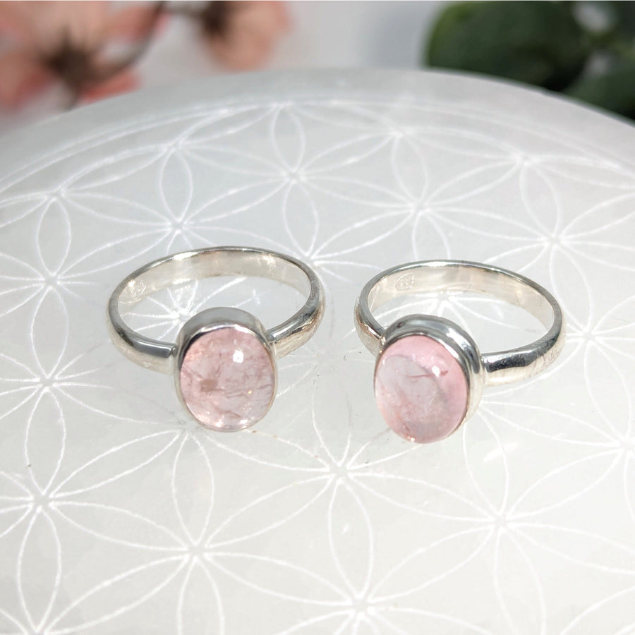 Pink Morganite oval rings with silver bands featuring pink stones