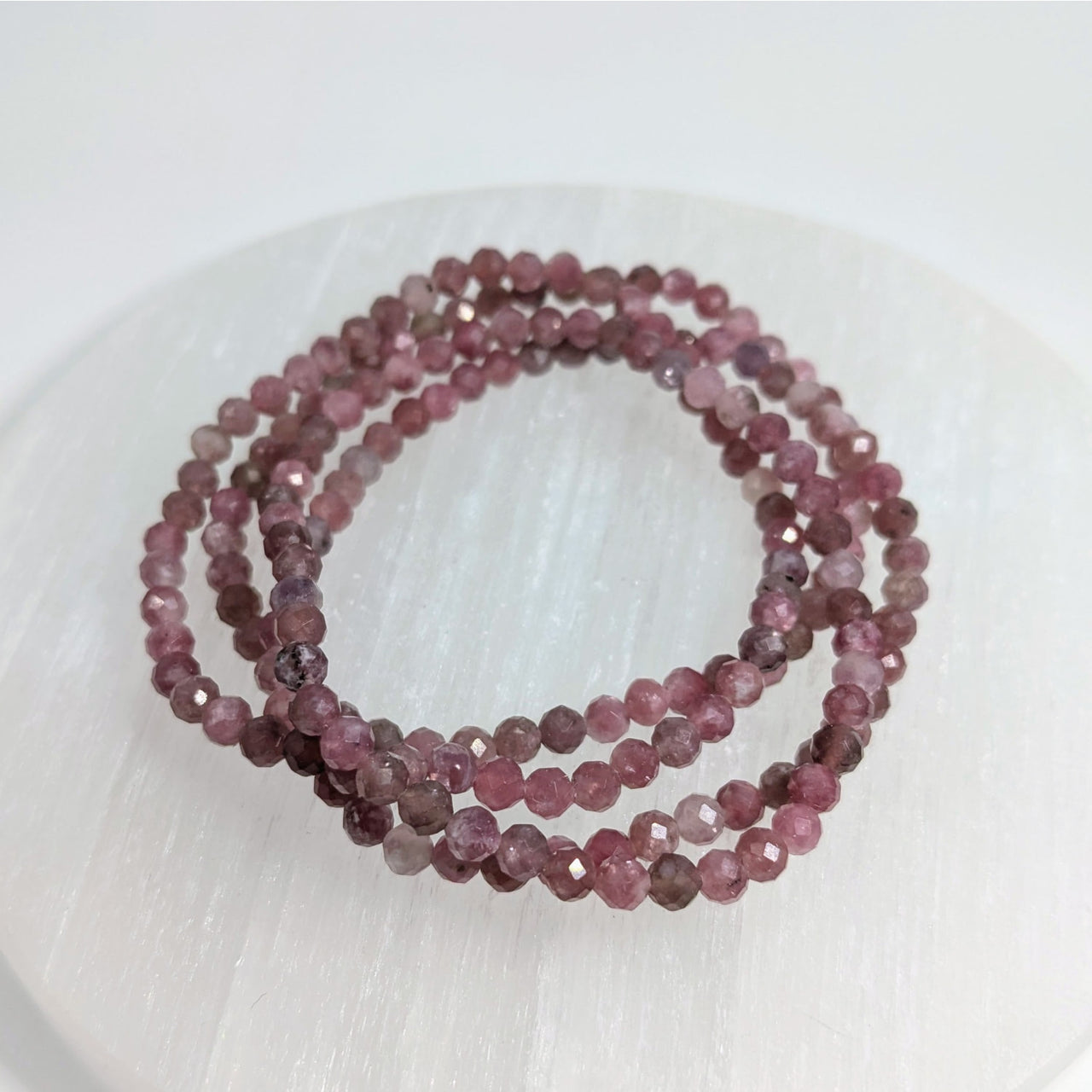 Pink Tourmaline 7’’ Faceted 4mm Bracelet coiled in a spiral with pink beads