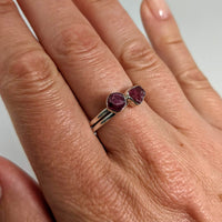 Thumbnail for A woman’s hand wearing a pink tourmaline sterling silver ring, #SK7300 stackable and dainty