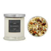 Prosperity soy candle with metallic lid, natural wax, and green gemstones