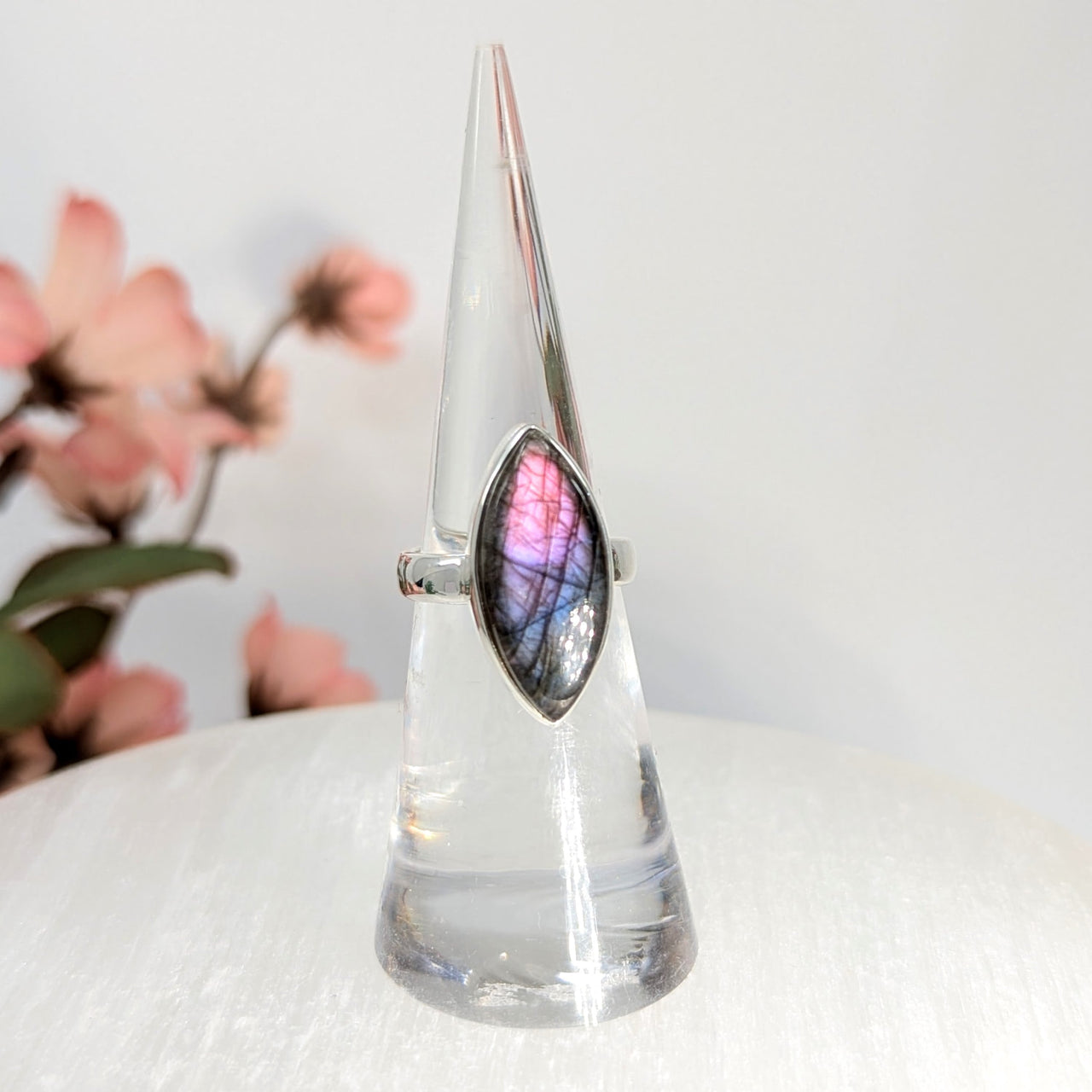 Marquise-cut Labradorite ring in purple hues displayed in Purple Labradorite Sz 5 Marquis Ring S.S. #LV7936