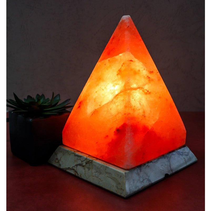 Pyramid Shape Salt Lamp 7-8 lb on Marble Base with small plant in background #LV3584