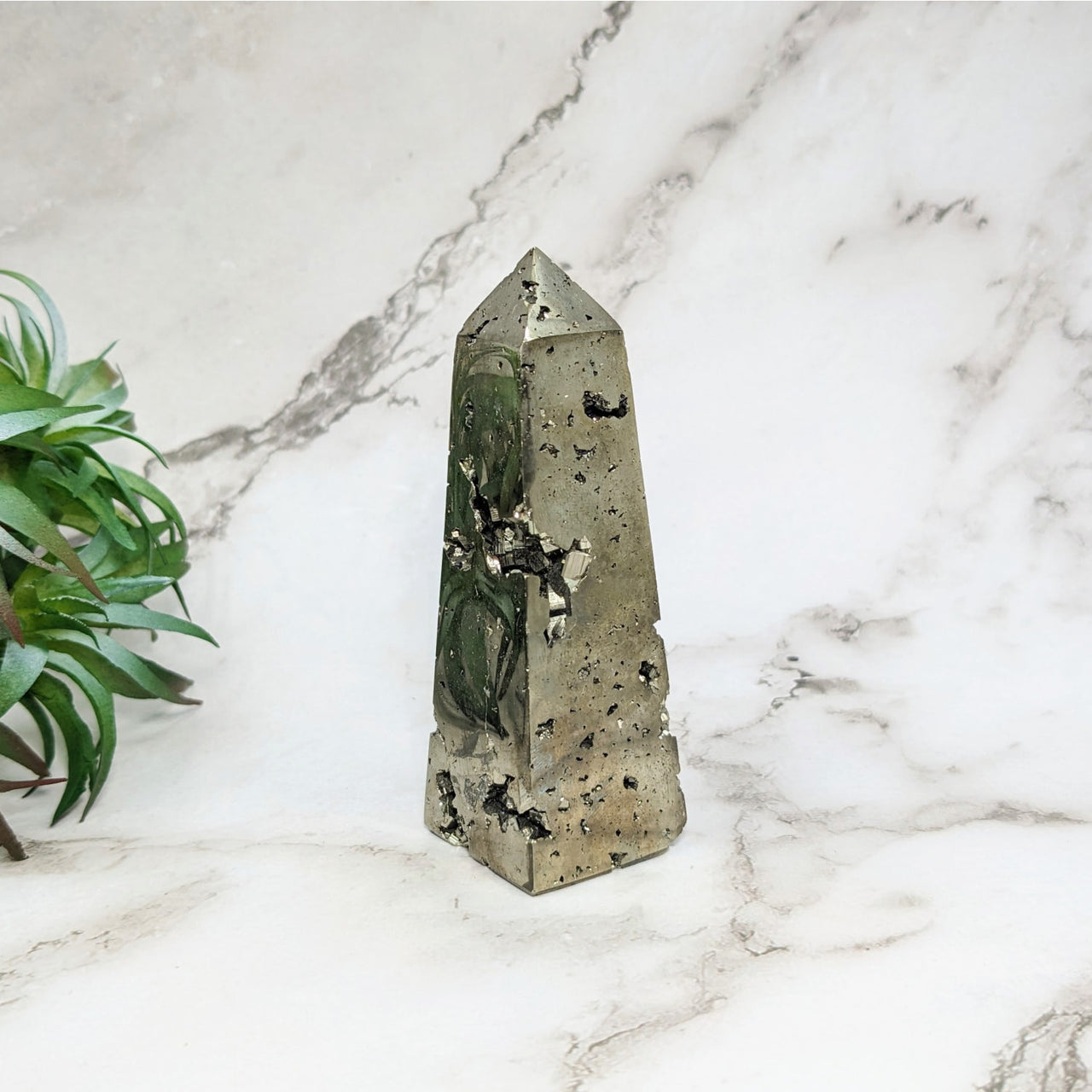 Small green quartz point on marble table - Pyrite 3.4’ Tower #LV5203