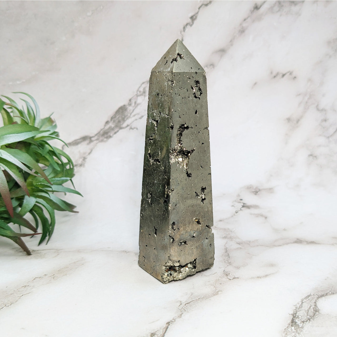 Pyrite 4.2’ Tower #LV5200 featuring a small stone with a glimmering metal inclusion