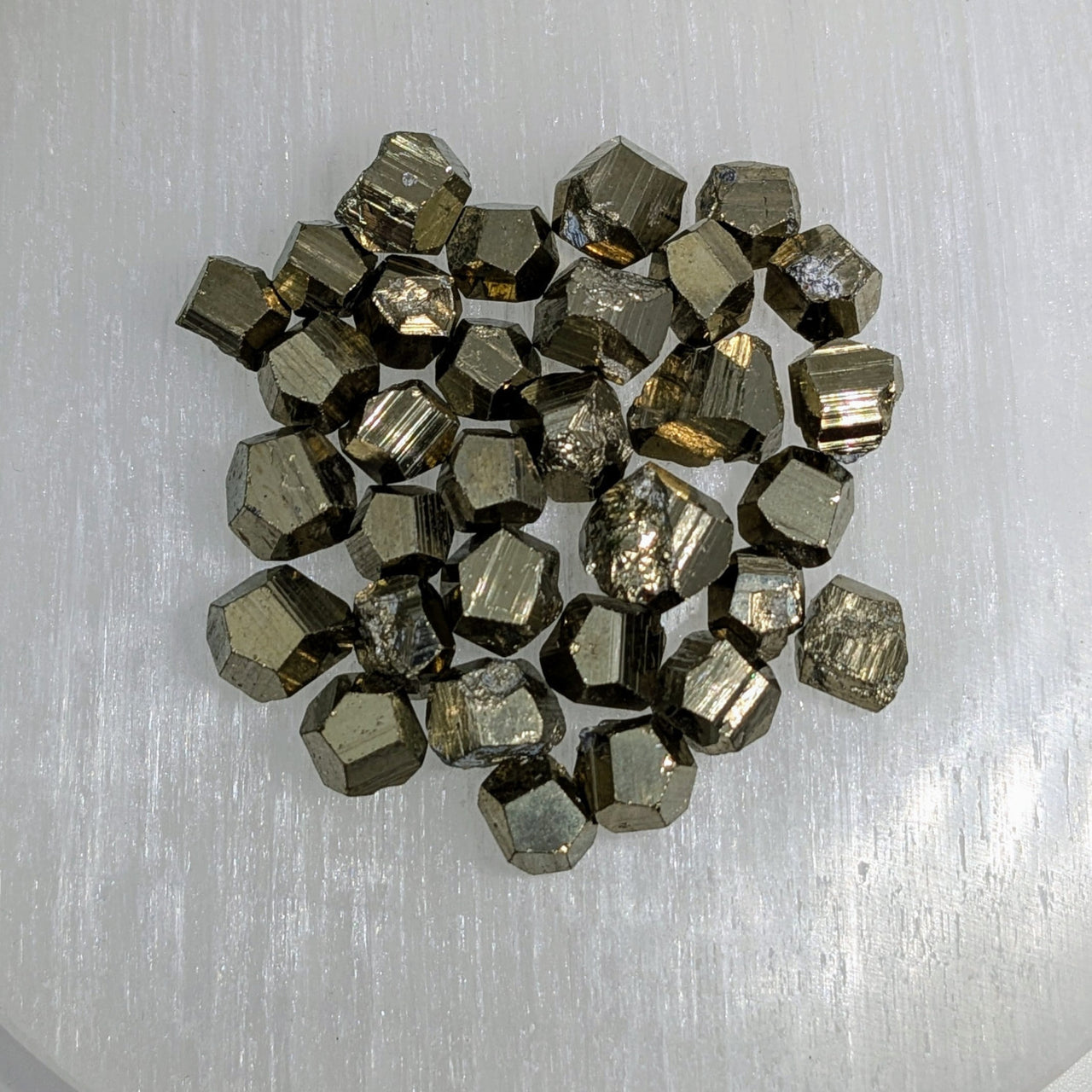 Collection of Pyrite Mini Nuggets featuring geometric hexagonal crystal shapes