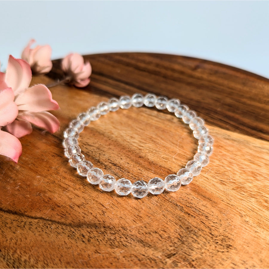 Clear beaded bracelet with 6mm faceted quartz beads in a 7-inch length