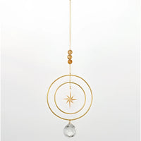Radiant Star gold starburst suncatcher with clear crystal ball and amber beads, Woodstock #SUNST