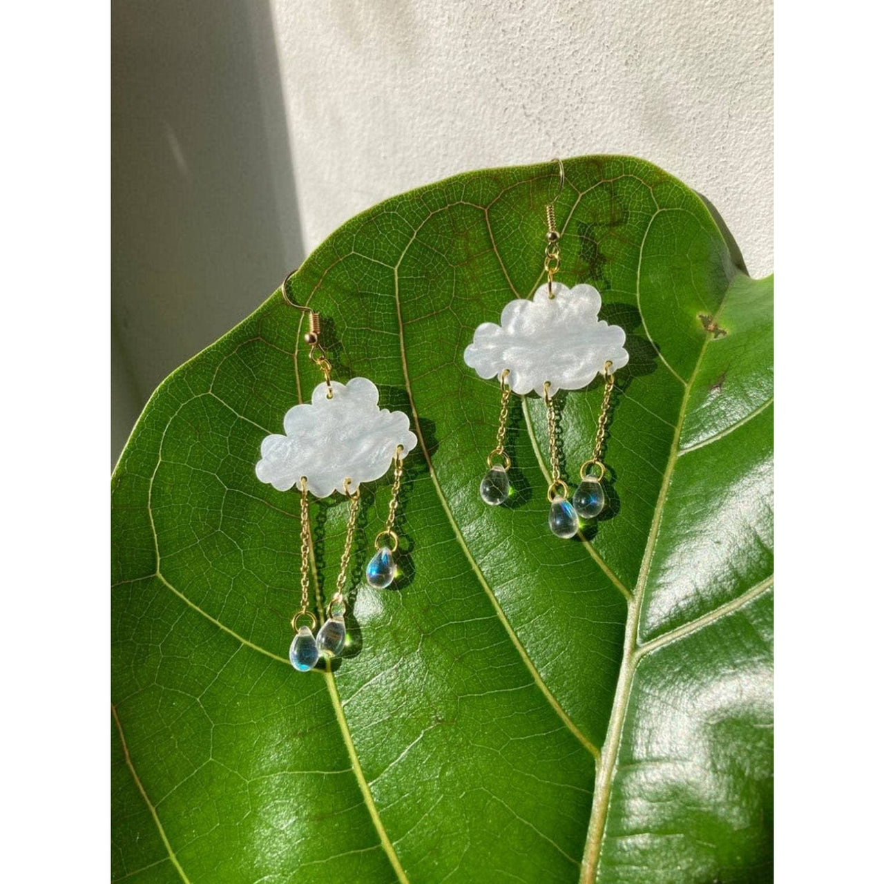 Rain Cloud Earrings with cloud-shaped design and raindrop dangles for a stylish look