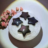Thumbnail for Four rainbow obsidian star crystals carved from volcanic molten lava natural glass