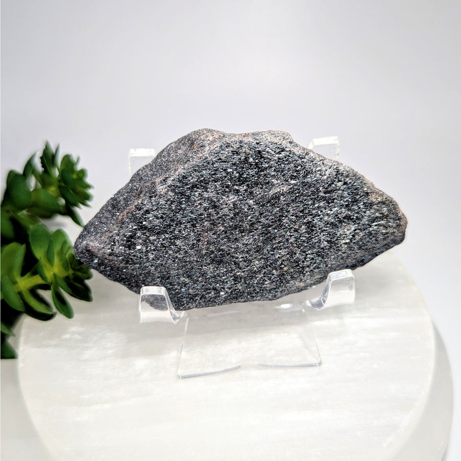 Raw 3.3-inch hematite shimmer stone #BC0608 on acrylic stand