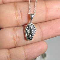 Thumbnail for Person holding Raw Sterling Silver Crystal Pendant for positive energy