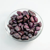 Thumbnail for Purple polished stones in a glass bowl for Red Ruby Tumbled #T010 with item tier benefits