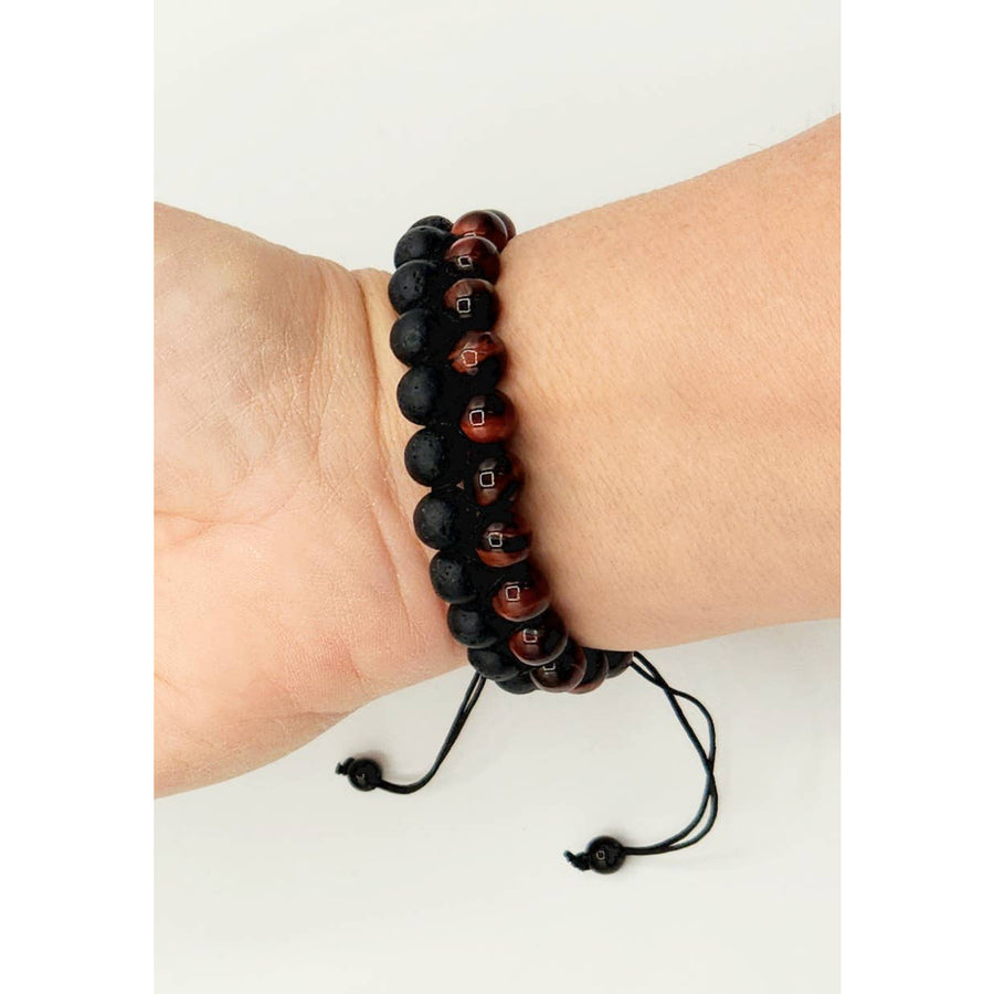 Beaded Red Tiger Eye and Black Lava woven adjustable bracelet on wrist