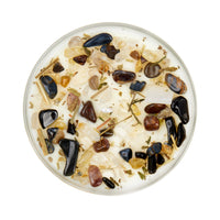 Release Ritual soy herb crystal candle with stones and herbs in glass holder