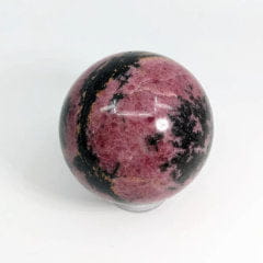 Rhodonite Crystal Sphere - Pink and black specimen for Gemini emotional healing