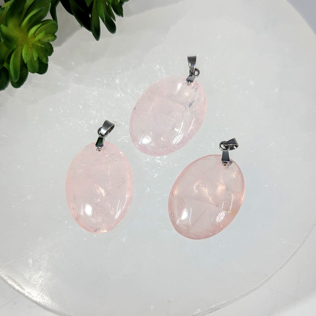 Three 1-inch oval pink rose quartz pendants with silver clasps #BC0291
