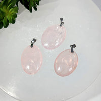Three 1-inch oval pink rose quartz pendants with silver clasps #BC0291