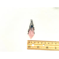 Rose quartz 12-faceted pendulum with antique silver detailing and black gems