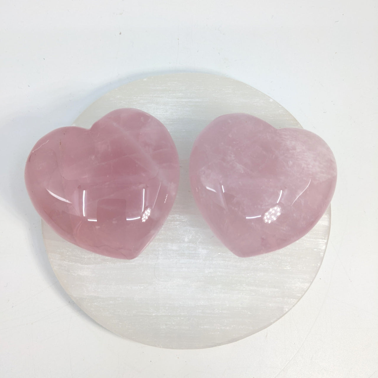 Pink heart-shaped Rose Quartz crystals for healing and decorative purposes