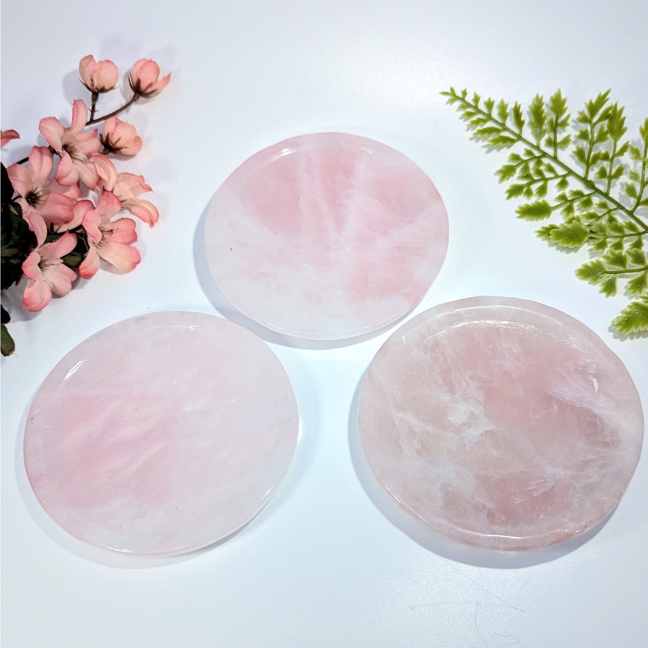 Three translucent pink rose quartz coasters with marbled patterns, 4’’ saucer #BC0727