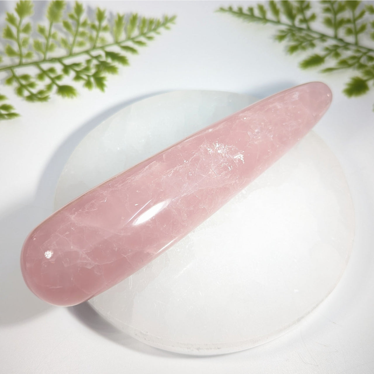 Rose quartz 6.2 inch smooth translucent pink crystal massage wand for relaxation and healing with polished oval shape