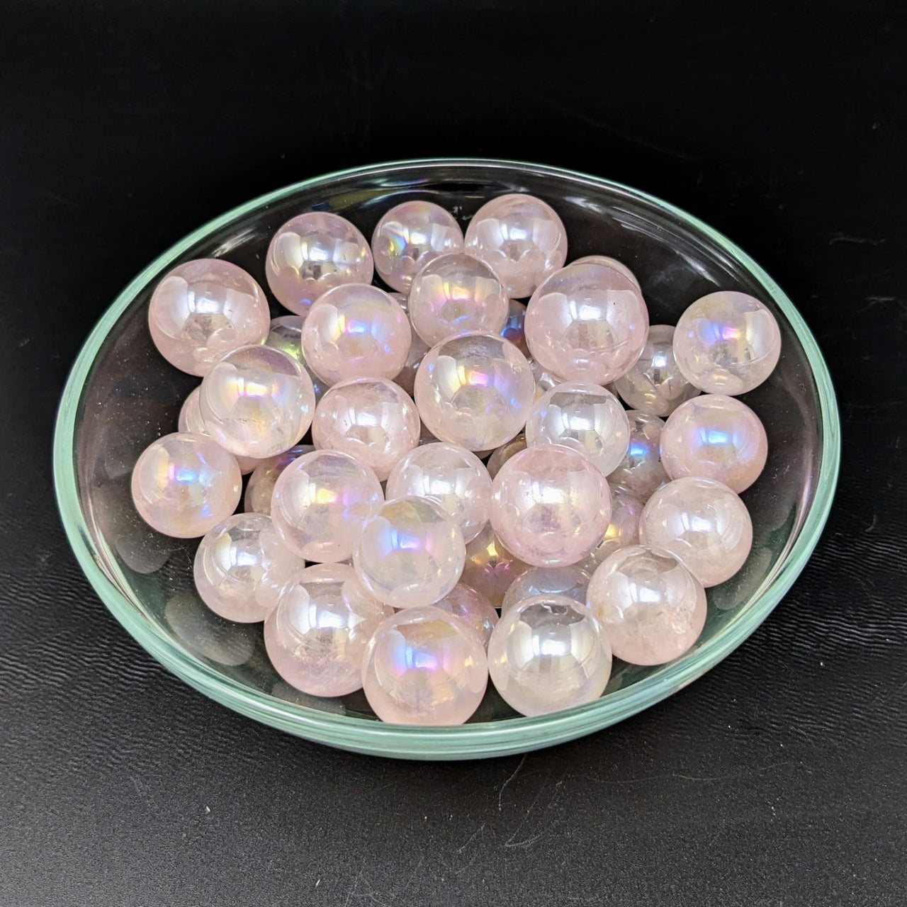 Rose Quartz .90’ Aura Sphere #LV1831 - Bowl of Pink Glass Beads on Black Surface