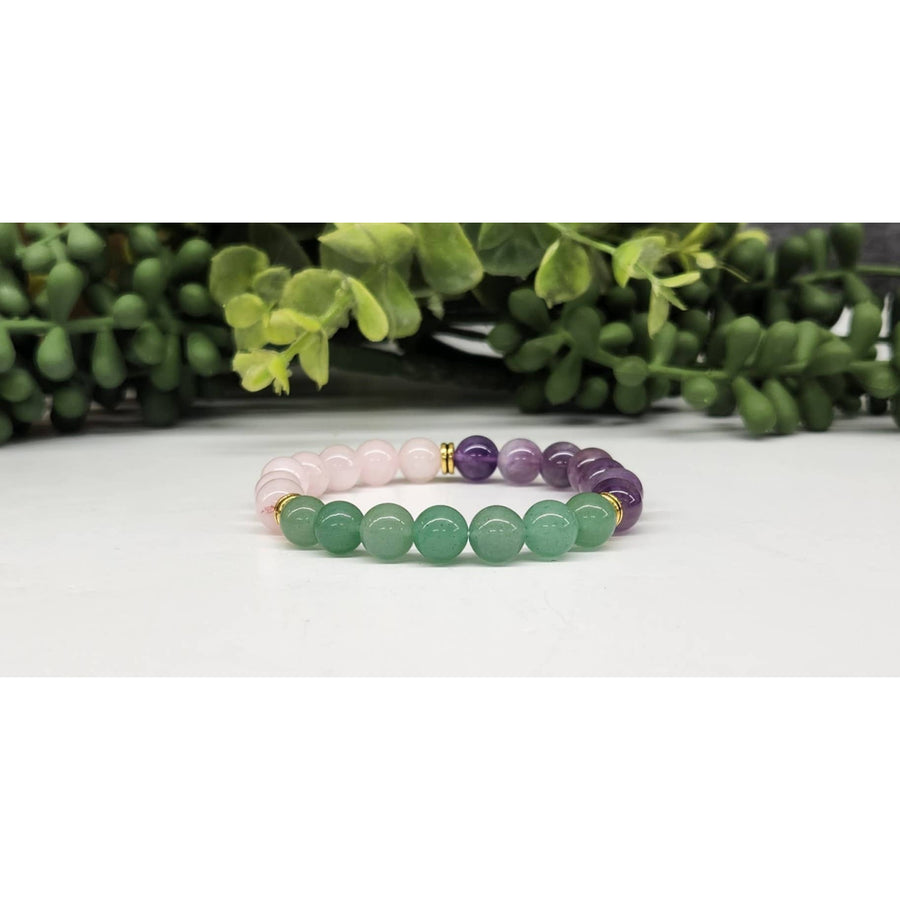 Beaded gemstone bracelet featuring Rose Quartz, Amethyst, and Green Aventurine for fertility