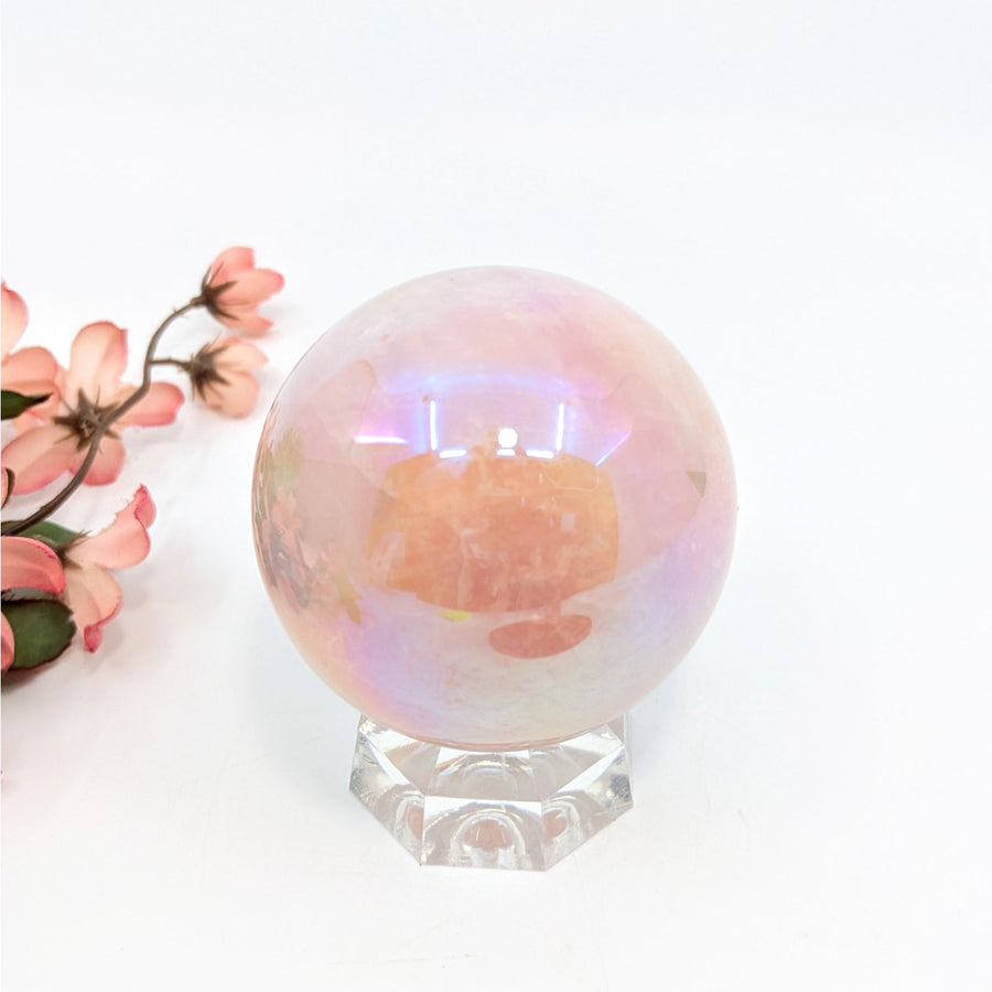 Iridescent Rose Quartz Aura 2.5’’ Sphere on clear stand symbolizing heart’s deepest yearnings
