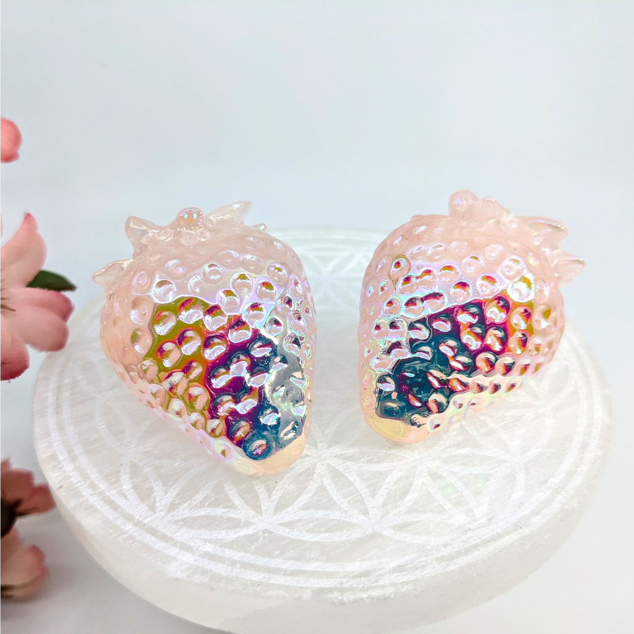 Iridescent strawberry figurines from Rose Quartz Aura 2 inch Strawberry Carving collection