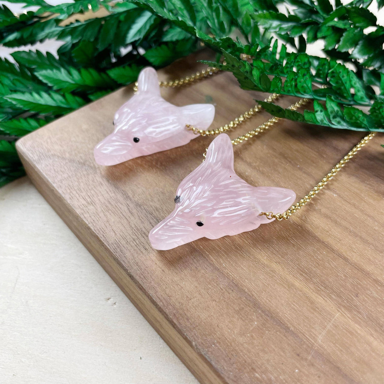 Pink rose quartz carved wolf necklace with gold chain, 18 inches